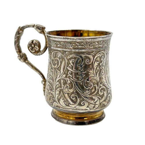 164 - A MINIATURE SILVER TANKARD WITH EXTENSIVE EMBOSSED DECORATION, FRENCH, EARLY 20TH CENTURYA miniature... 