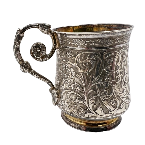 164 - A MINIATURE SILVER TANKARD WITH EXTENSIVE EMBOSSED DECORATION, FRENCH, EARLY 20TH CENTURYA miniature... 