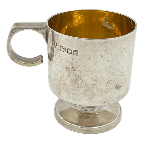 168 - A SMALL MODERN SILVER MUG OF PLAIN FORM, LONDON, GIBSON & CO, 1988A small modern silver mug of plain... 