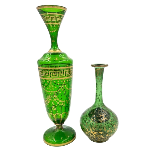 17 - TWO GREEN BOHEMIAN GLASS VASES, LATE 19TH CENTURYTwo green Bohemian glass vases adorned with intrica... 