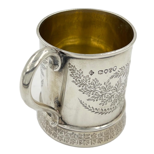 170 - A LATE VICTORIAN SILVER CHRISTENING MUG WITH FOLIATE DETAIL THROUGHOUT, MARTIN HALL & CO,1882A late ... 