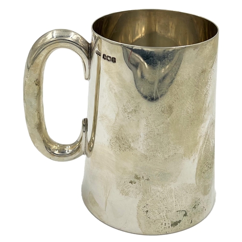 174 - A GOOD SIZE SILVER TANKARD OF PLAIN AND TAPERING FORM, JAMES DIXONT & SONS, 1928A good size silver t... 