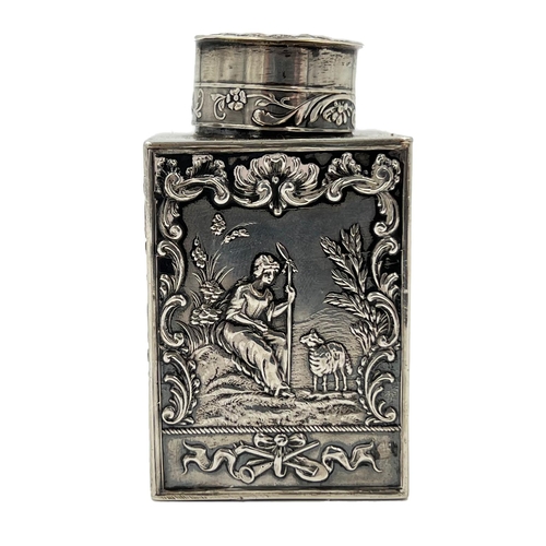 188 - A SMALL SILVER LIDDED TEA CADDY EMBOSSED WITH RURAL SCENES BY BERTHOLD MULLER, 1912A small silver li... 