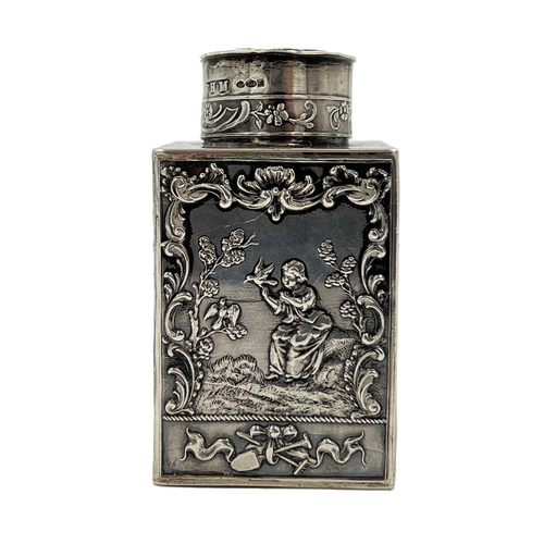 188 - A SMALL SILVER LIDDED TEA CADDY EMBOSSED WITH RURAL SCENES BY BERTHOLD MULLER, 1912A small silver li... 