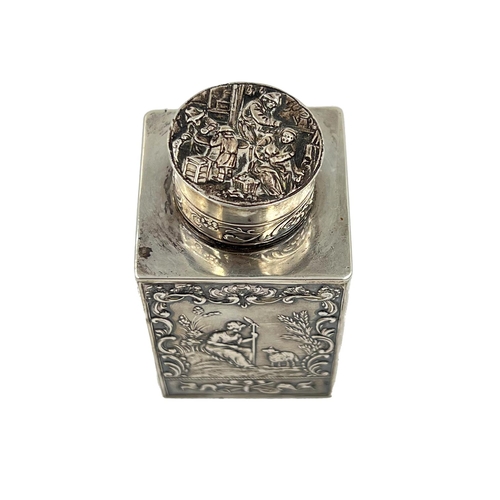 188 - A SMALL SILVER LIDDED TEA CADDY EMBOSSED WITH RURAL SCENES BY BERTHOLD MULLER, 1912A small silver li... 