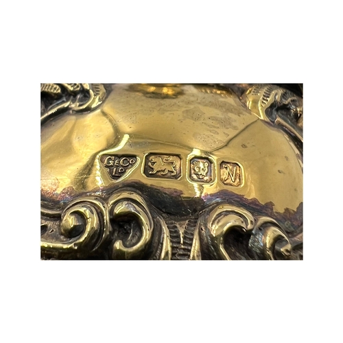 191 - A STUNNING SILVER GILT TABLE BELL WITH INTRICATE EMBOSSED DECORATION, LONDON, GARRAD &CO, 1987A stun... 