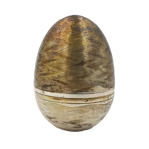 209 - A NICHOLAS PLUMMER SILVER SURPRISE EGG THAT OPENS TO REVEAL FLOWERS, LONOND, NICHOLOS PLUMMER, 2005A... 