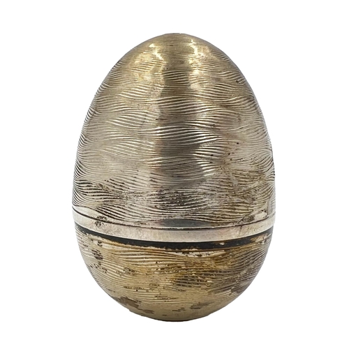 210 - A NICHOLAS PLUMMER SILVER SURPRISE EGG THAT OPENS TO REVEAL A ROSEBUSH, LONOND, 2003A Nicholas Plumm... 