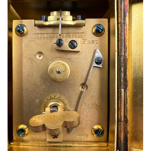 215 - A SMALL SILVER CASED MANTEL/TRAVELLING CLOCK WITH CIRCULAR ENGINE TURNED ENGRAVING, LONDON, 1909A sm... 