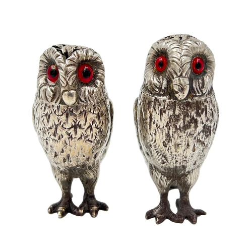 216 - A FINE CASED MATCHED PAIR OF SILVER OWL SALT AND PEPPER POTS, LONDON, 1865/68A good cased pair of si... 