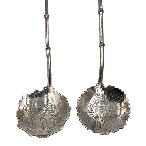 219 - A FINE SIX SILVER TEASPOONS WITH NATURALISTIC, STEMS AND DIFFERING FINIALS WITH COOLIE INDICATIONSA ... 