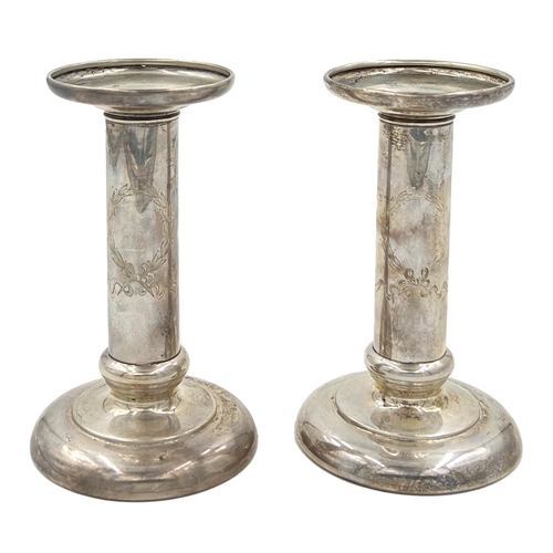 224 - A PAIR OF STERLING OF SILVER CANDLESTICKS IN STYLISH MODERN MODEA pair of sterling of silver candles... 