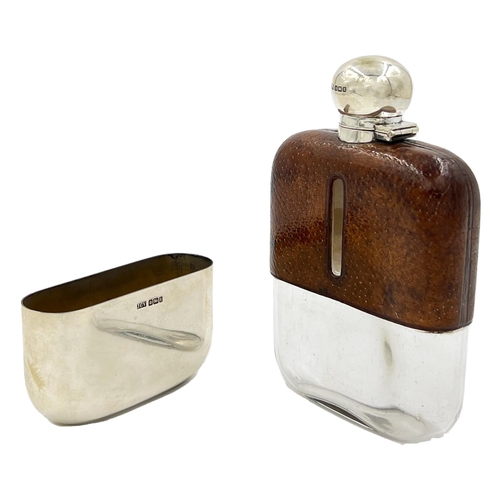 225 - A SILVER TOPPED AND LEATHER CASED GLASS HIP FLASK, SHEFFIELD, JOHN COLLARD VICKERY, 1902A silver top... 