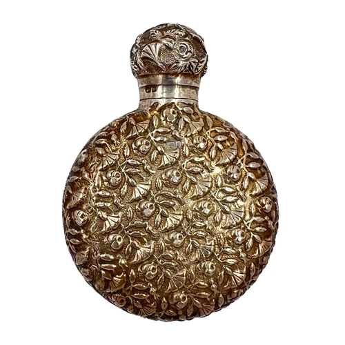 230 - A DELIGHTFUL SILVER PERFUME BOTTLE WITH EXTENSIVE FLORAL DECORATION THROUGHOUT, CHESTER,1891A deligh... 