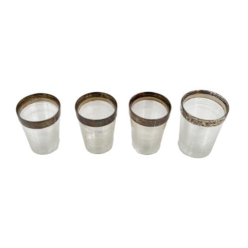 233 - A SET OF FOUR SILVER MOUNTED GRADUATED, STACKING BEAKERS, BIRMINGHAM, HUKIN & HEATH, 1894A matched s... 