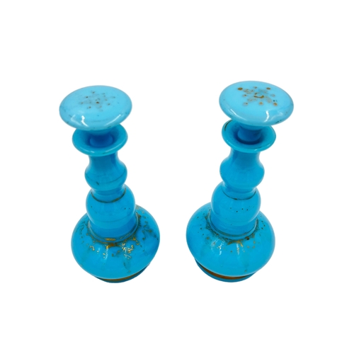 30 - PAIR OF OPALINE ELEGANCE – SKY BLUE OPALINE BOTTLESA pair of sky blue opaline bottles, adding a touc... 