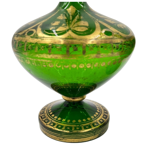 38 - REGAL GREEN AND GOLD – TWO BOHEMIAN GLASS VASESTwo regal green and gold Bohemian glass vases. Height... 