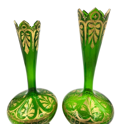 38 - REGAL GREEN AND GOLD – TWO BOHEMIAN GLASS VASESTwo regal green and gold Bohemian glass vases. Height... 