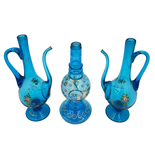 49 - BLUE SERENITY: BOHEMIAN GLASS EWER AND VASE SETThis set includes a serene blue Bohemian glass ewer (... 