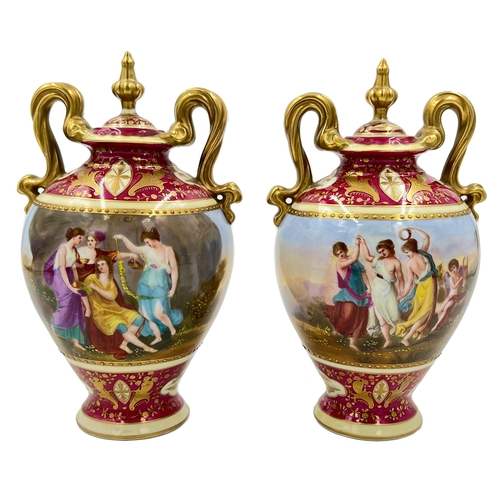 52 - VIENNA CHARM: ELEGANT PAIR OF PORCELAIN VASESA charming pair of Vienna vases standing at 23cm, showc... 