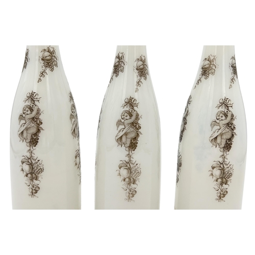 56 - THREE WHITE OPALINE BOTTLES WITH STOPPERSEnhance your collection with this opulent trio of white opa... 