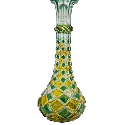 70 - MULTI-COLOURED BOHEMIAN GLASS BOTTLEA vibrant Bohemian glass bottle boasting a mesmerizing array of ... 