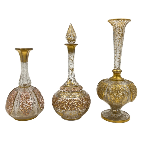 78 - SET OF BOHEMIAN GLASS VASES AND BOTTLE A charming set comprising two Bohemian glass vases and a bott... 