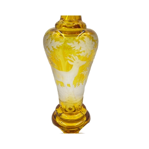 9 - AMBER ELEGANCE – 19TH CENTURY BOHEMIAN, AMBER-STAINED GLASS CANDLE HOLDERElegant 19th-century Bohemi... 