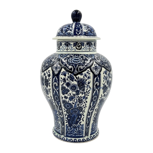 91 - BLUE AND WHITE PORCELAIN VASE BY BOCHA classic blue and white porcelain vase crafted by Boch, standi... 