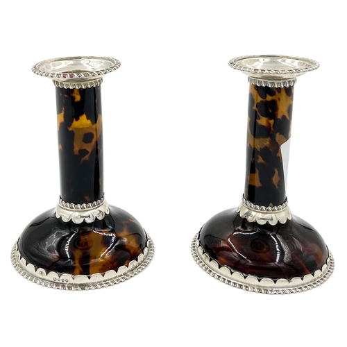 137 - A FINE PAIR OF SILVER MOUNTED TORTOISESHELL CANDLESTICKS, LONDON, WILLIAM COMYNS, 1889A fine pair of... 