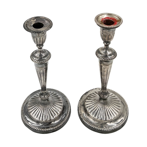 138 - A PAIR OF GEORGIAN SILVER CANDLESTICKS WITH FLUTED DECORATION, SHEFFIELDA pair of Georgian silver ca... 