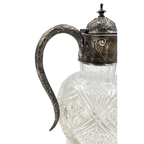 141 - A VICTORIAN SILVER MOUNTED CUT GLASS WINE JUG, BIRMINGHAM, HENERY BOURNE, 1880 - 1895A Victorian sil... 