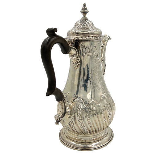 143 - A FINE QUALITY GEORGIAN SILVER COFFEE POT WITH EMBOSSED DECORATION, LONDON, JOHN PAYNE, 1759A good q... 