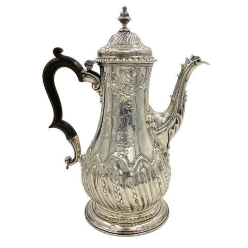 143 - A FINE QUALITY GEORGIAN SILVER COFFEE POT WITH EMBOSSED DECORATION, LONDON, JOHN PAYNE, 1759A good q... 