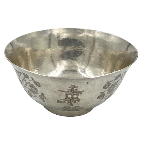 156 - A SMALL SILVER CHINESE BOWL OF TAPERING FORM WITH TYPICAL CHRYSANTHEMUM FLORAL ENGRAVINGA small silv... 