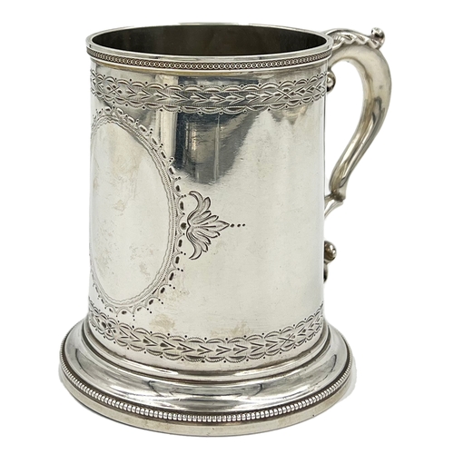 159 - A FINE QUALITY AND SIZE VICTORIAN SILVER TANKARD WITH BRIGHT CUT DECORATION, ROBERT HARPER, 1874A go... 