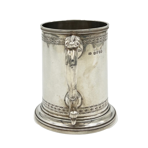 159 - A FINE QUALITY AND SIZE VICTORIAN SILVER TANKARD WITH BRIGHT CUT DECORATION, ROBERT HARPER, 1874A go... 