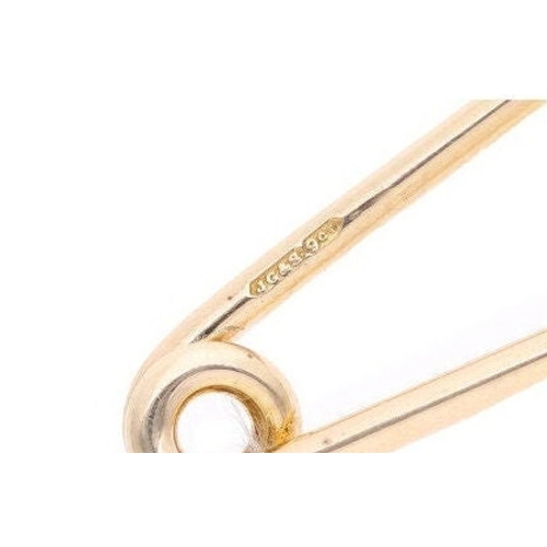 26 - 
  Large 9ct Gold Pin Brooch. 
 
 
  
 

  HALLMARKS: marked for 9ct Gold 
 
 
  
 

  MEASUREMENT: ... 