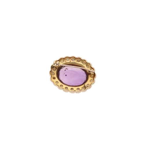 30 - 9ct Gold Amethyst and Pearl Brooch. 
 
  
 

  HALLMARKS: marked for 9ct Gold 
 
 
  
 

  MEASUREME... 