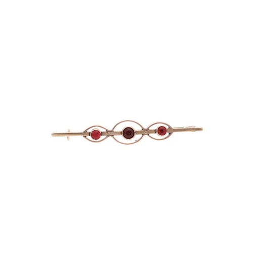 33 - 9ct Gold and Red Paste Three Stone Brooch 
 
  
 

  HALLMARKS: marked for 9ct Gold 
 
 
  
 

  MEA... 