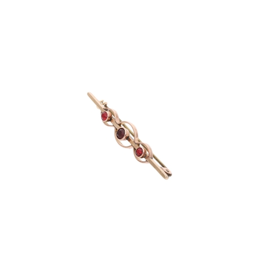 33 - 9ct Gold and Red Paste Three Stone Brooch 
 
  
 

  HALLMARKS: marked for 9ct Gold 
 
 
  
 

  MEA... 
