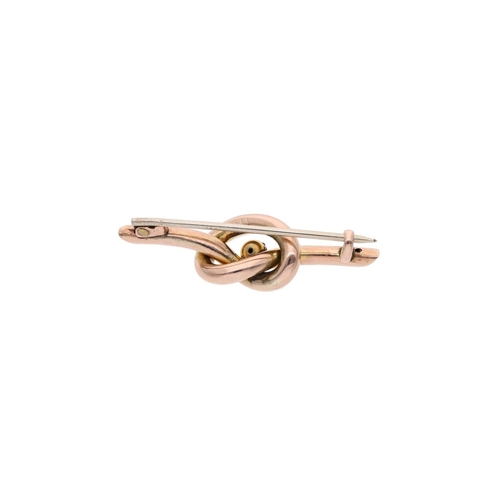 35 - 9ct Gold Love Knot Brooch 
 
  
 

  HALLMARKS: marked for 9ct Gold 
 
 
  
 

  MEASUREMENT: 40mm l... 