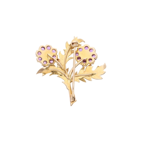 65 - 9ct Gold Amethyst and Pearl Flower Brooch 
 
  
 

  HALLMARKS: marked for 9ct Gold 
 
 
  
 

  MEA... 