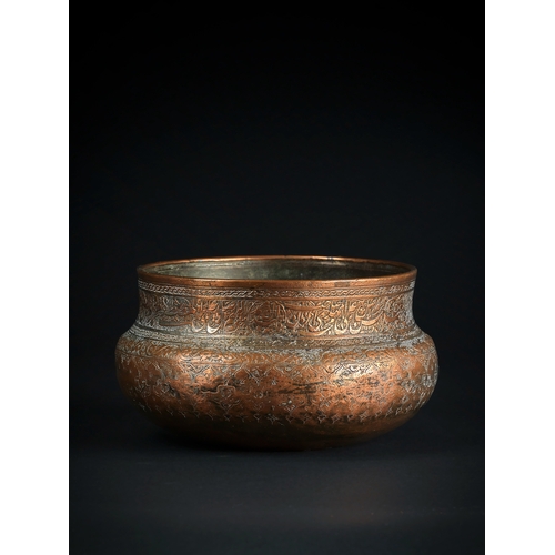 104 - A SAFAVID TINNED COPPER BOWL, IRAN, 17TH - 18TH CENTURY Of compressed circular shape, on a gently ro... 