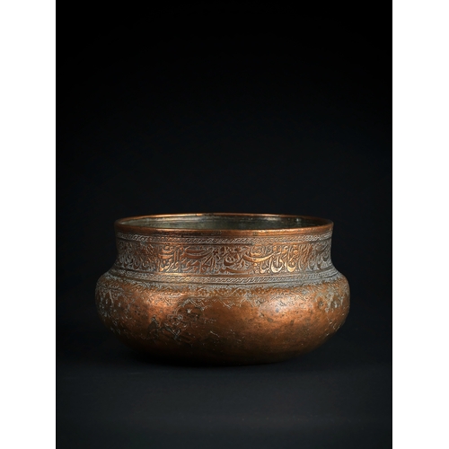 104 - A SAFAVID TINNED COPPER BOWL, IRAN, 17TH - 18TH CENTURY Of compressed circular shape, on a gently ro... 