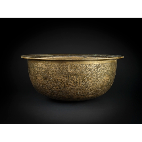 105 - A LARGE MAMLUK ENGRAVED BRASS BASIN, EGYPT OR SYRIA, LATE 15TH/ EARLY 16TH CENTURY    of deep rounde... 