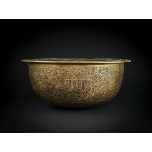 105 - A LARGE MAMLUK ENGRAVED BRASS BASIN, EGYPT OR SYRIA, LATE 15TH/ EARLY 16TH CENTURY    of deep rounde... 