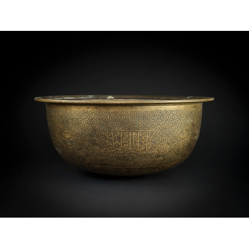 105 - A LARGE MAMLUK ENGRAVED BRASS BASIN, EGYPT OR SYRIA, LATE 15TH/ EARLY 16TH CENTURY    of deep rounde... 