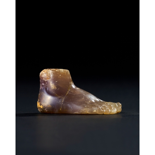 12 - A ROMAN OR LATER CHALCEDONY PURPLE AGATE FOOT, CIRCA 1ST CENTURY B.C. - 2ND CENTURY A.D. The foot is... 