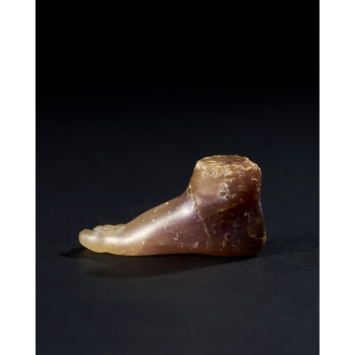 12 - A ROMAN OR LATER CHALCEDONY PURPLE AGATE FOOT, CIRCA 1ST CENTURY B.C. - 2ND CENTURY A.D. The foot is... 